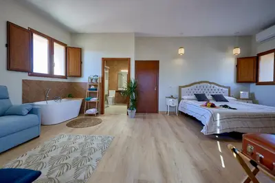 Cama o camas de una habitación en Dùplex Argollas Grand Suite Centro Parking gratis
