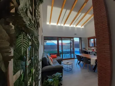 Zona de estar de Acogedora casa rural con piscina particular Barlow TR-CC-00426
