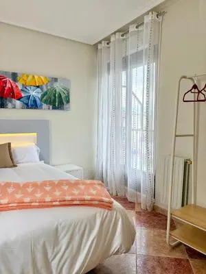 Cama o camas de una habitación en CÓMODO alojamiento en Alba de Tormes