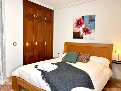 Cama o camas de una habitación en CÓMODO alojamiento en Alba de Tormes