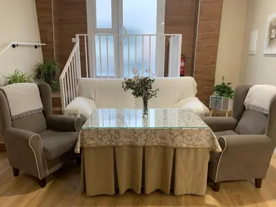 Zona de estar de Apartamentos La Unión