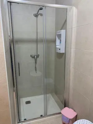 Un baño de Apartamentos La Unión