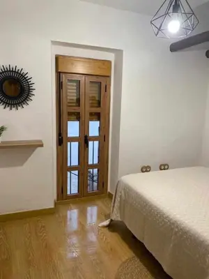 Cama o camas de una habitación en Casa Grande Hornos 18
