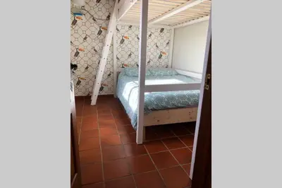 Cama o camas de una habitación en Vuelos de Montaña l