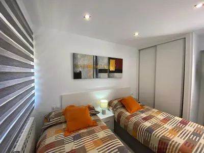 Cama o camas de una habitación en Precioso Apartamento Parque Picasso !!!