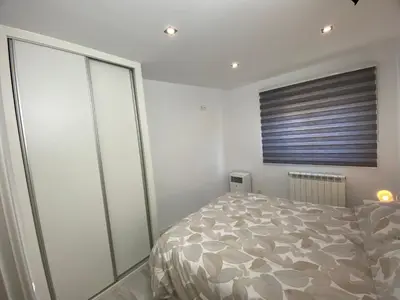 Cama o camas de una habitación en Precioso Apartamento Parque Picasso !!!