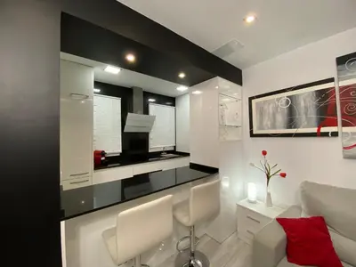 Una cocina o zona de cocina en Precioso Apartamento Parque Picasso !!!