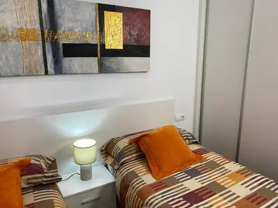 Cama o camas de una habitación en Precioso Apartamento Parque Picasso !!!