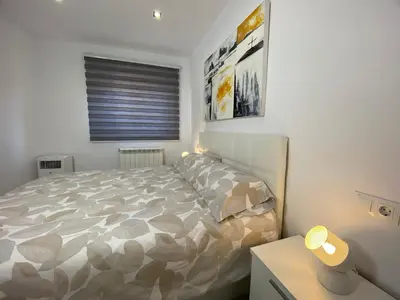 Cama o camas de una habitación en Precioso Apartamento Parque Picasso !!!