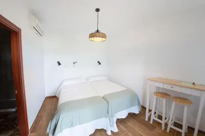 Cama o camas de una habitación en Los Chozos del Geoparque
