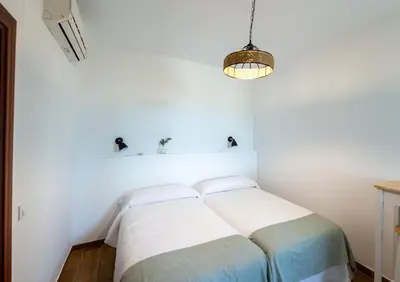 Cama o camas de una habitación en Los Chozos del Geoparque