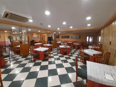 Un restaurante o sitio para comer en Hotel Nuevo Lorenzo