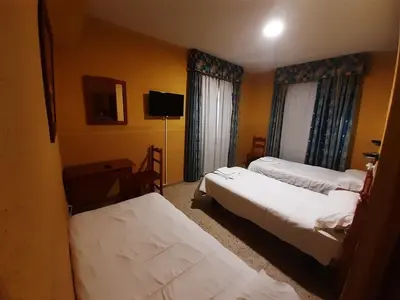 Cama o camas de una habitación en Hotel Nuevo Lorenzo