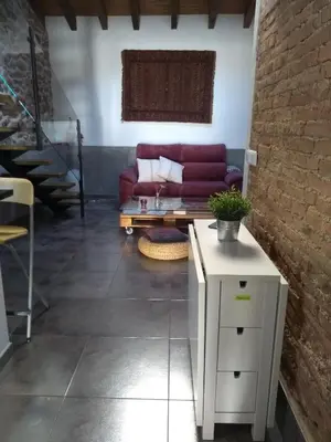 Zona de estar de La Plazuela del Tiétar, diseño y descanso en Gredos sur