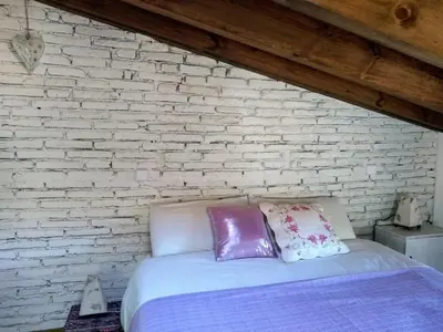 Cama o camas de una habitación en La Plazuela del Tiétar, diseño y descanso en Gredos sur