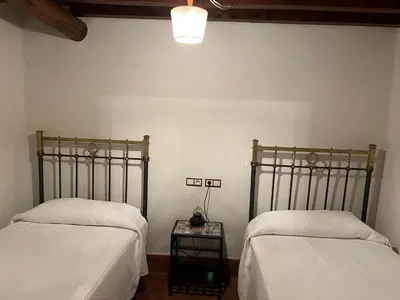 Cama o camas de una habitación en La Centenaria de Alaraz