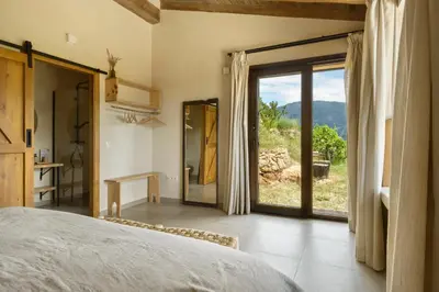Cama o camas de una habitación en Cerrás Agroturismo