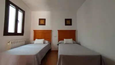 Cama o camas de una habitación en Antiguo Consistorio