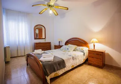 Cama o camas de una habitación en EL HOGAR DEL HERRERO