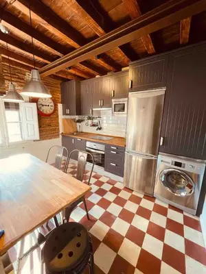 Una cocina o zona de cocina en Qué bueno que viniste Plasencia Edificio Singular