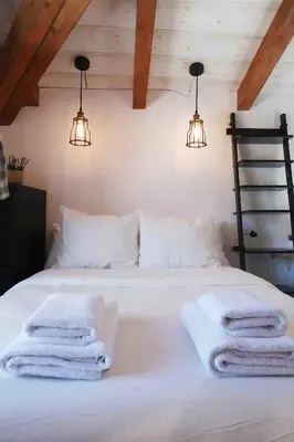 Cama o camas de una habitación en Qué bueno que viniste Plasencia Edificio Singular
