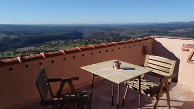 Un balcón o terraza de Apartamentos bioclimáticos El Mirlo Azul