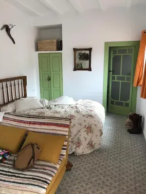 Cama o camas de una habitación en Apartamentos bioclimáticos El Mirlo Azul