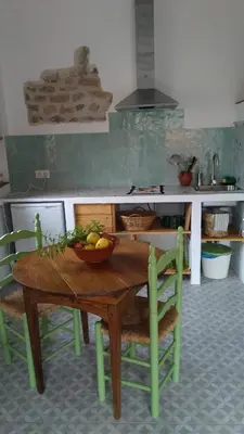 Una cocina o zona de cocina en Apartamentos bioclimáticos El Mirlo Azul