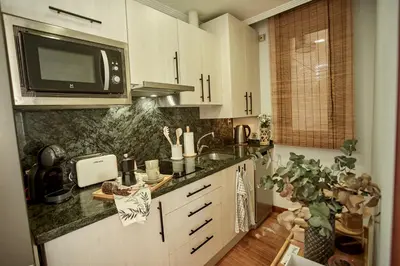 Una cocina o zona de cocina en Salamanca Rentals - Apartamento con terraza a 1 minuto de la Plaza Mayor
