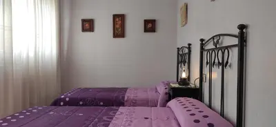 Cama o camas de una habitación en Casa Rural Julia