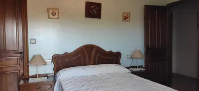 Cama o camas de una habitación en Casa Rural Julia