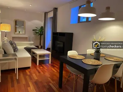 Una televisión o centro de entretenimiento en HomyAT DUPLEX PRIOR
