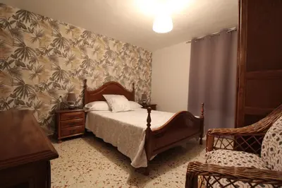 Cama o camas de una habitación en Casa rural Victoria