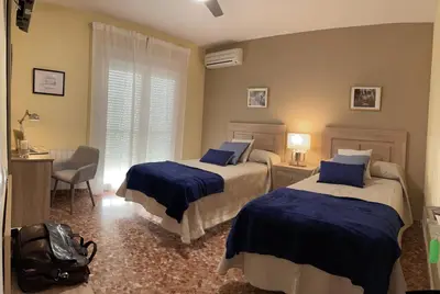 Cama o camas de una habitación en CERES Home Parking Gratis