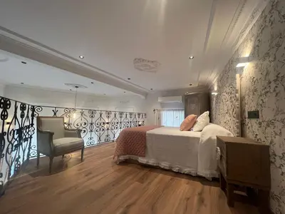 Cama o camas de una habitación en Alojamiento Santa Teresa