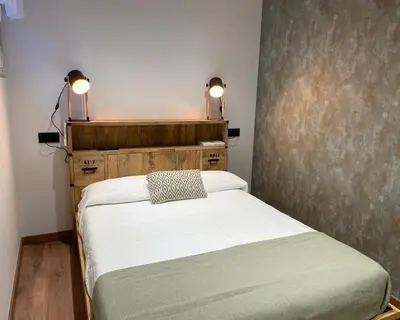 Cama o camas de una habitación en Alojamiento Santa Teresa