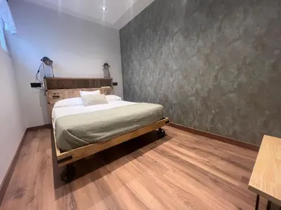 Cama o camas de una habitación en Alojamiento Santa Teresa