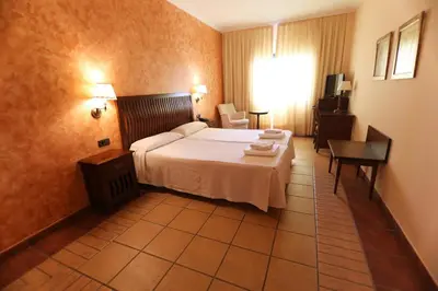 Cama o camas de una habitación en Hospedium Hotel Doña Mafalda de Castilla