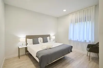 Cama o camas de una habitación en Inés Luna Suites