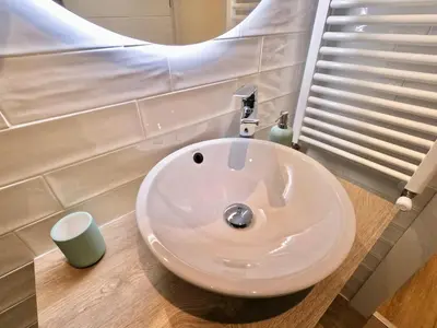 Un baño de VUT REAL DE ARRIBA
