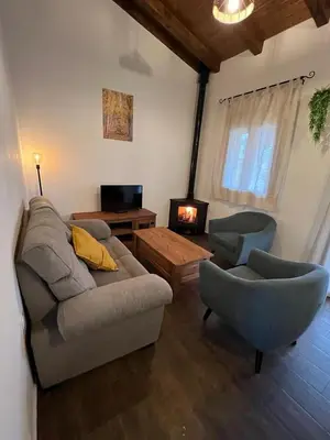 Zona de estar de APARTAMENTOS DOÑA JIMENA DEL AMBROZ 4 Estrellas complejo único en el centro del pueblo