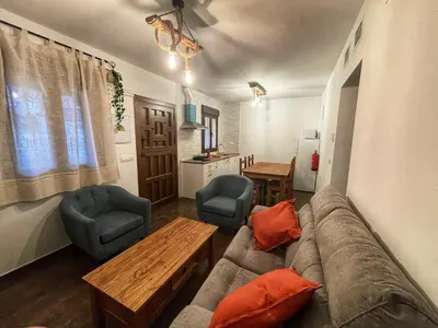 Zona de estar de APARTAMENTOS DOÑA JIMENA DEL AMBROZ 4 Estrellas complejo único en el centro del pueblo