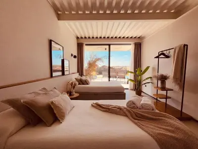 Cama o camas de una habitación en Villa de Diseño con Piscina Privada