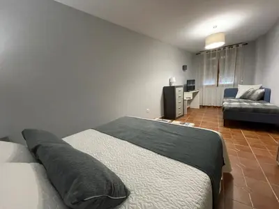 Cama o camas de una habitación en Hostal EL GRIEL NO DISPONEMOS DE RECEPCIÓN FÍSICA