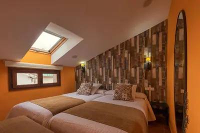 Cama o camas de una habitación en Hostal EL GRIEL NO DISPONEMOS DE RECEPCIÓN FÍSICA