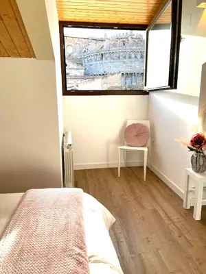 Cama o camas de una habitación en Estrada Suites