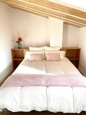 Cama o camas de una habitación en Estrada Suites