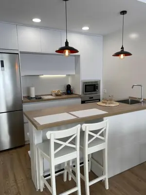 Una cocina o zona de cocina en Estrada Suites