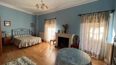 Cama o camas de una habitación en LA PARRA - Casa Rural en el Valle del Jerte