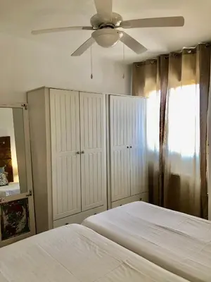 Cama o camas de una habitación en APARTAMENTO JALAMA 2D